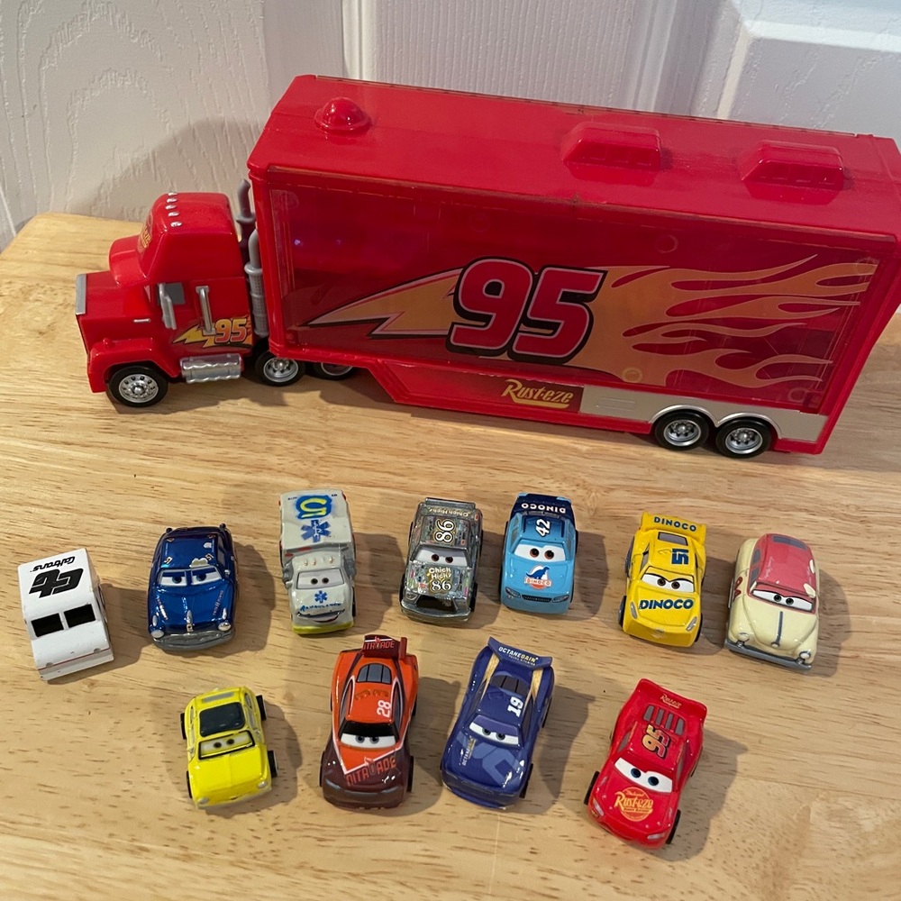 Disney Pixar Cars Mack Hauler and 10 Mini Racers